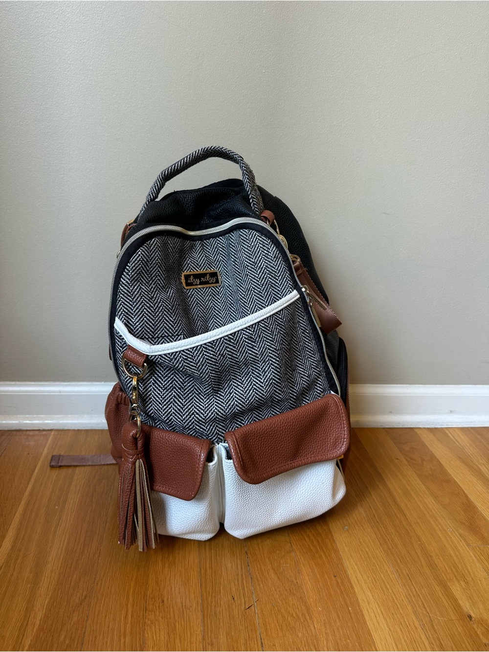 Itzy Ritzy Herringbone Baby Backpack in Black, White & Brown